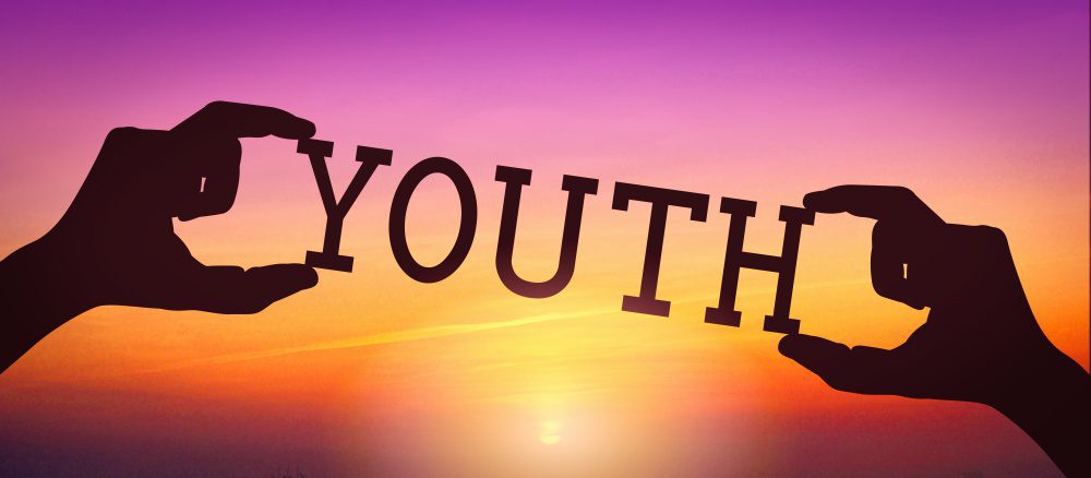 Youth human hands holding black silhouette word